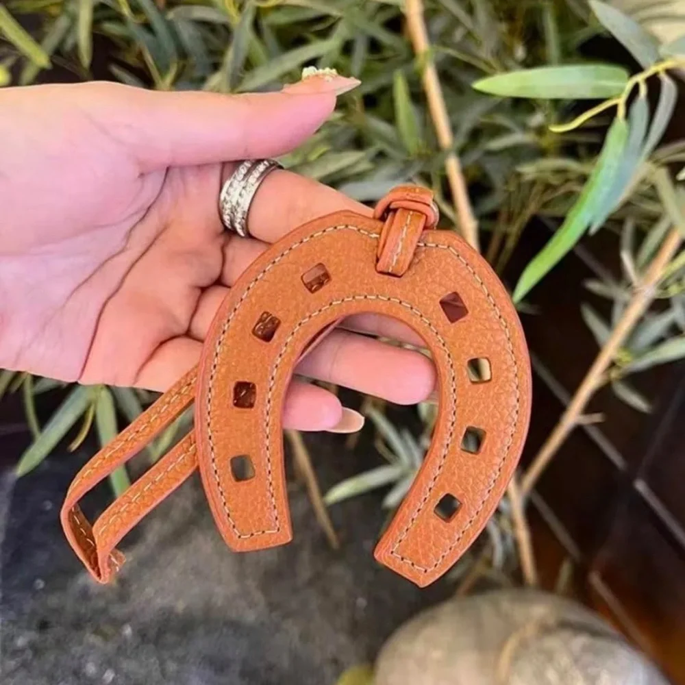 Designer luxury style Horse shoe H look bag charm in orange quiet luxury…